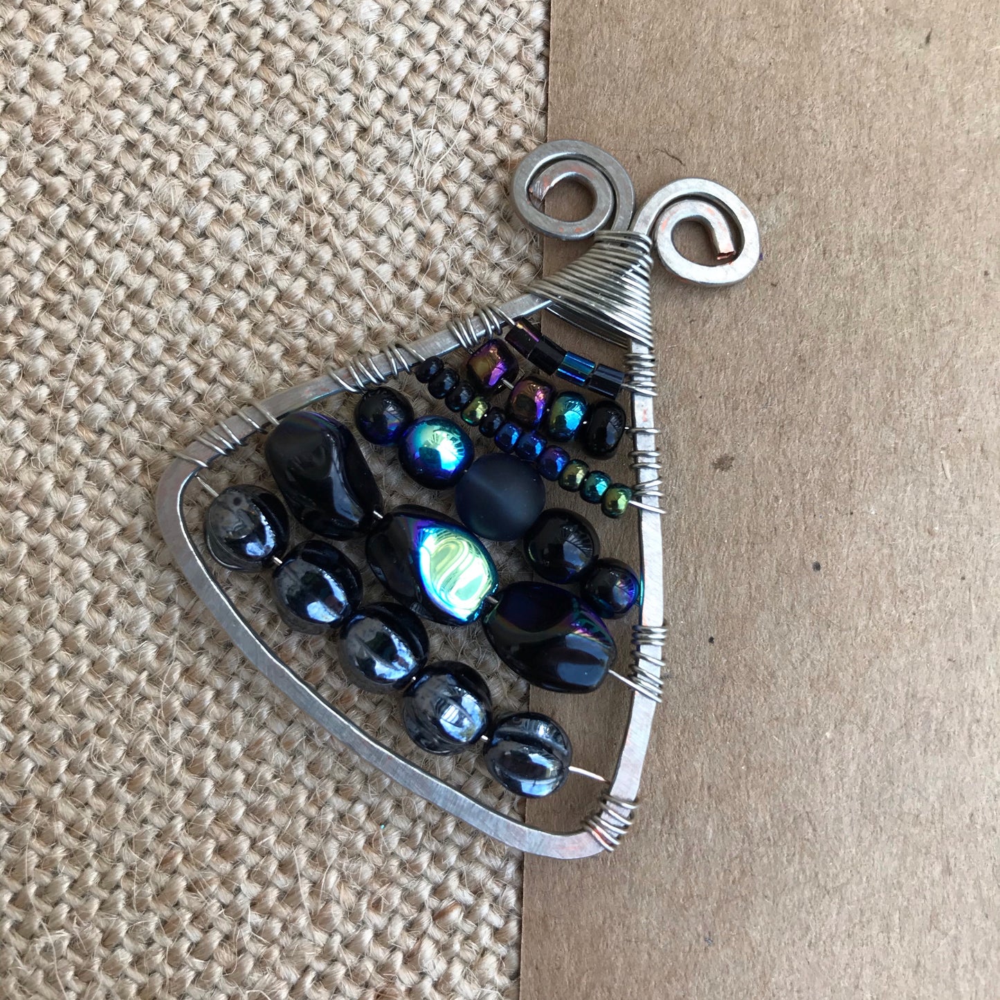 Black on Silver Triangle Wire Wrapped Pendant on Cord Necklace