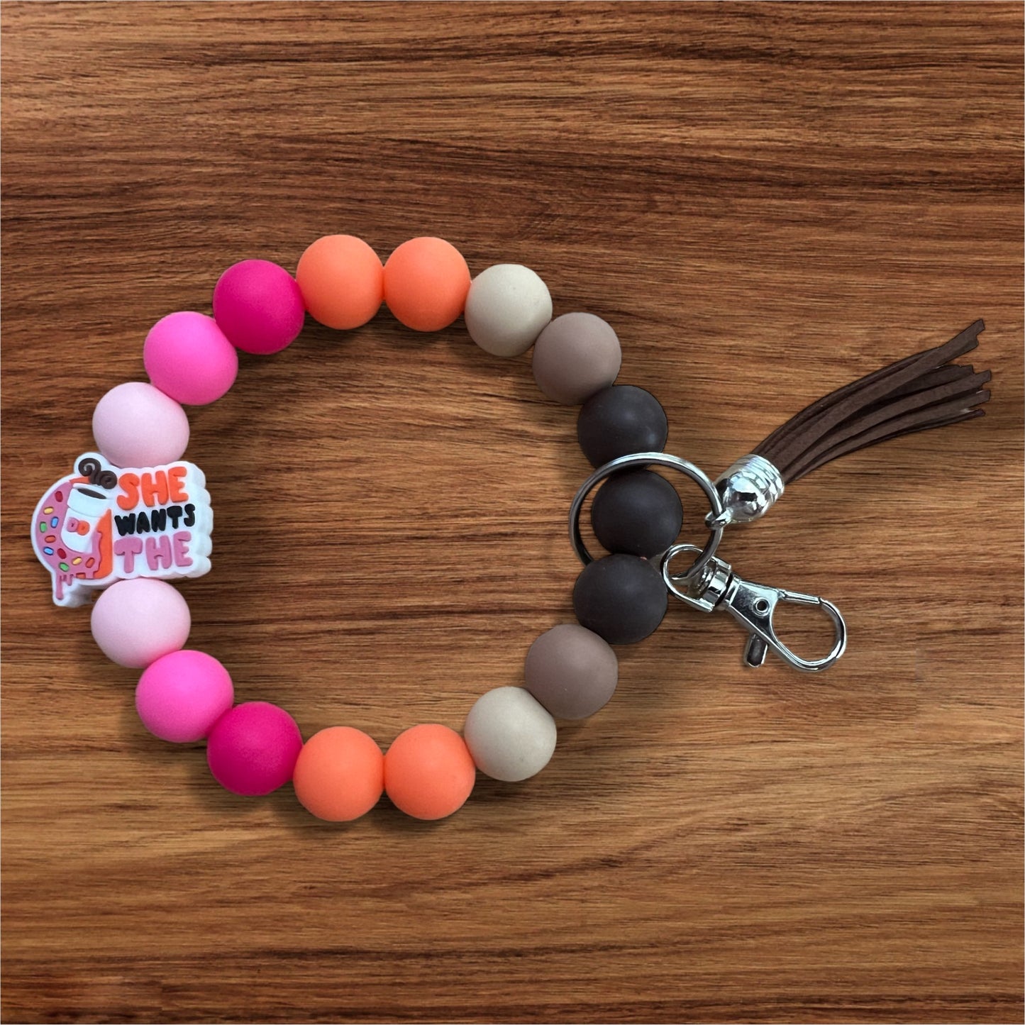 She wants the D Silicone Keychain Beaded Wristlet with Tassel